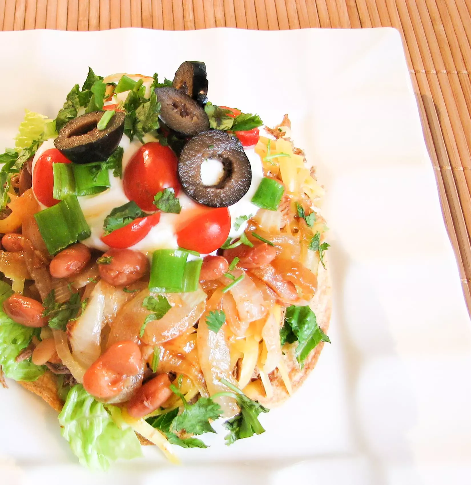 Shredded Beef and Caramelized Onion Tostadas