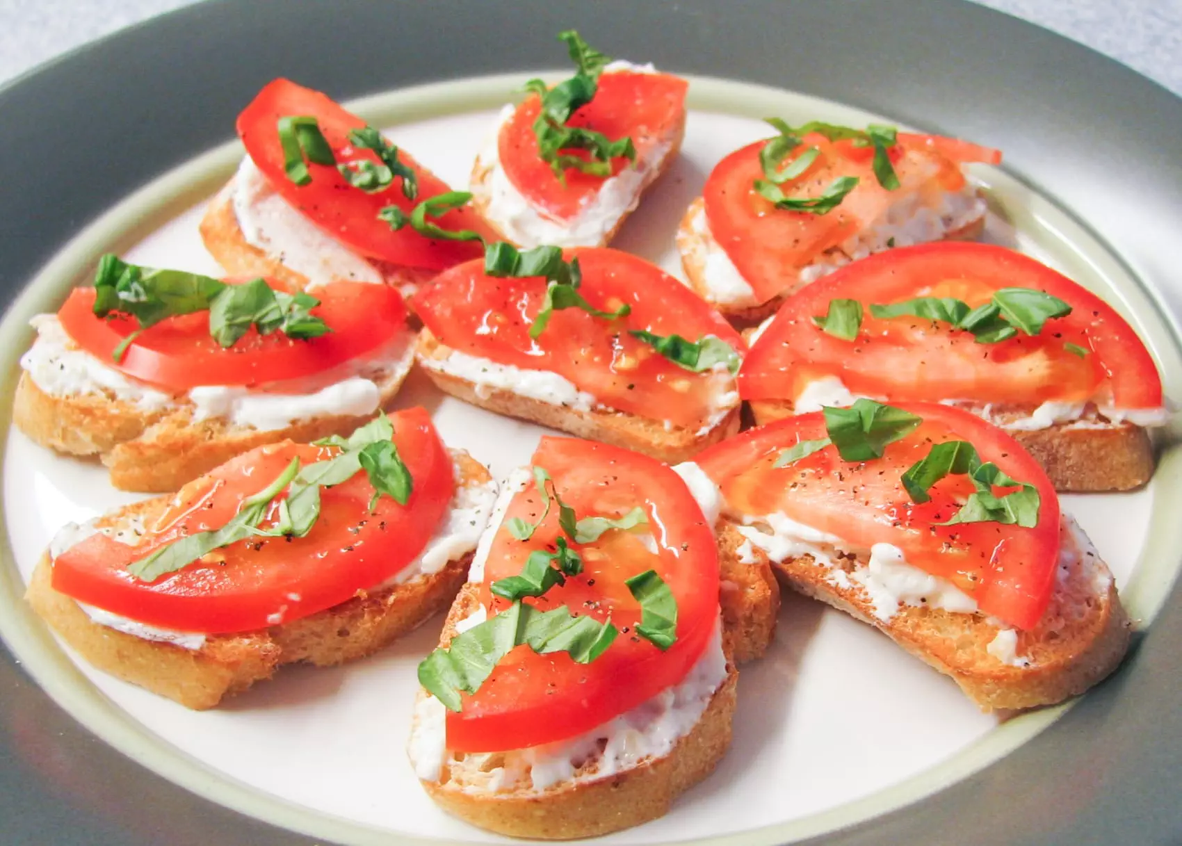 Tomato and Fresh Basil Crostini with Feta and Roasted Garlic Cheese Spread