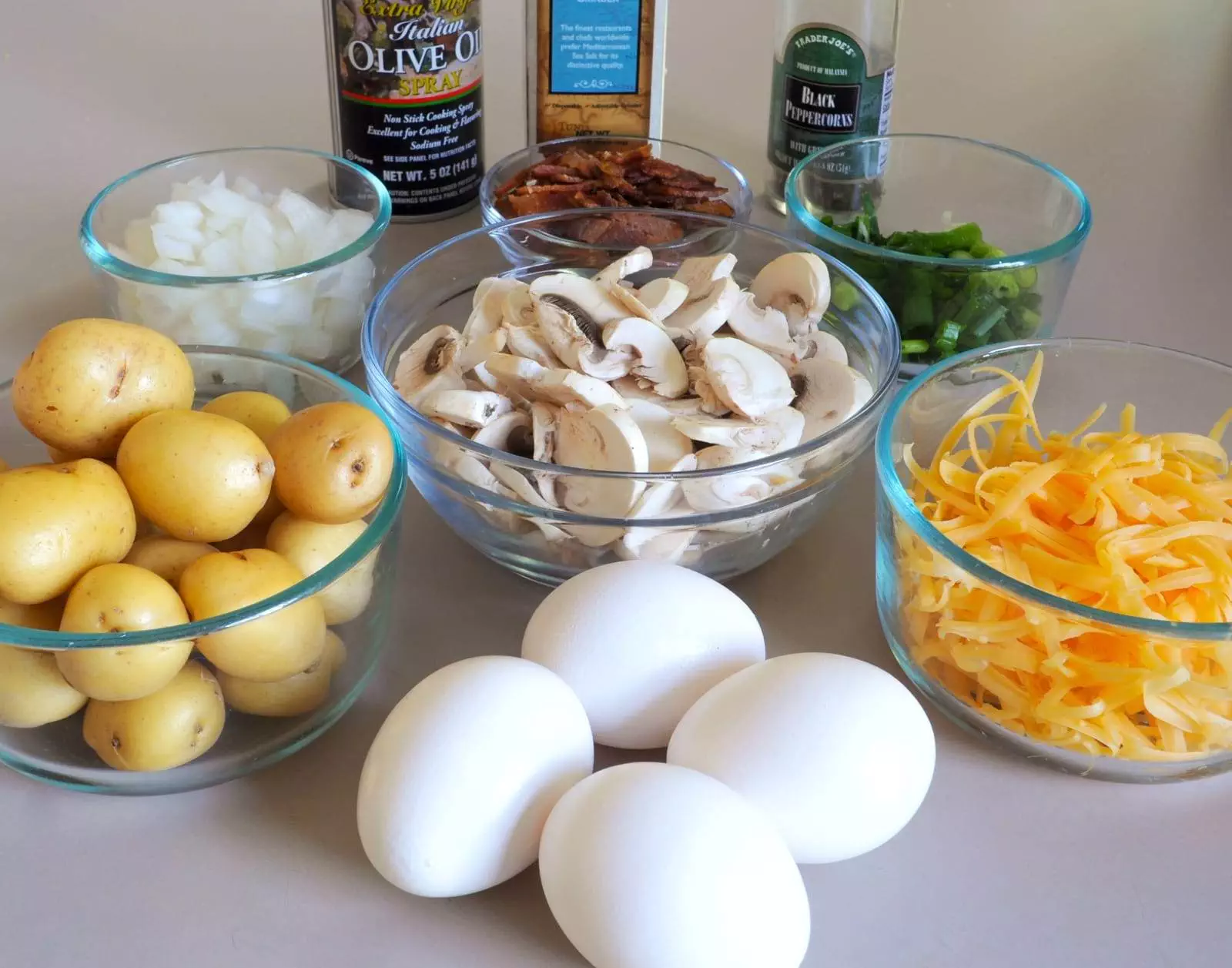 Peasant Omelet with Potatoes, Mushrooms, Bacon, and Cheddar