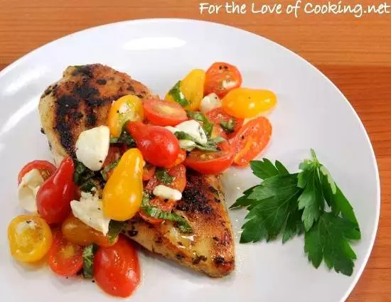 Garlic Basil Chicken topped with Caprese Salad