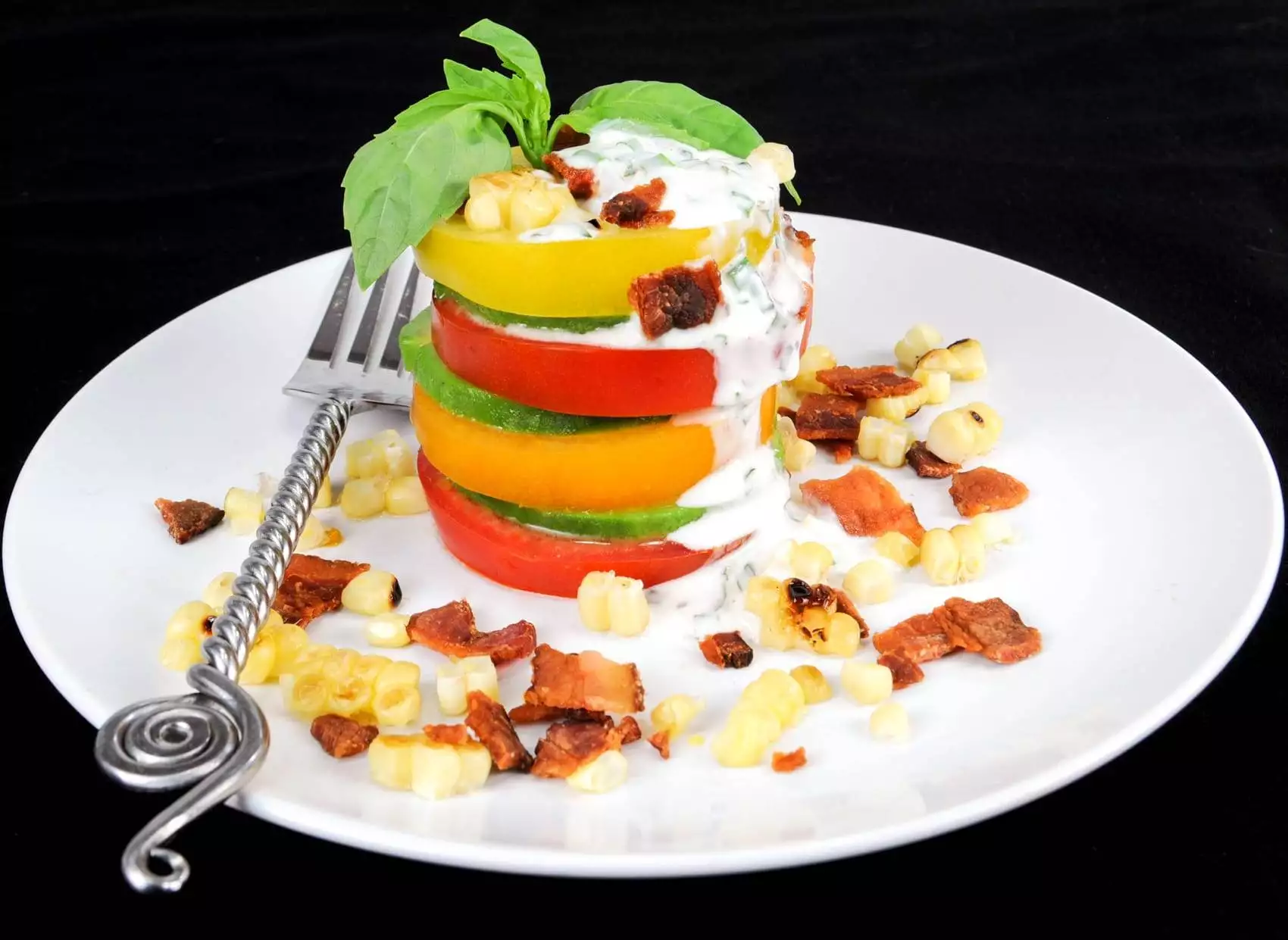 Tomato Stack Salad with Corn, Bacon, and Avocado