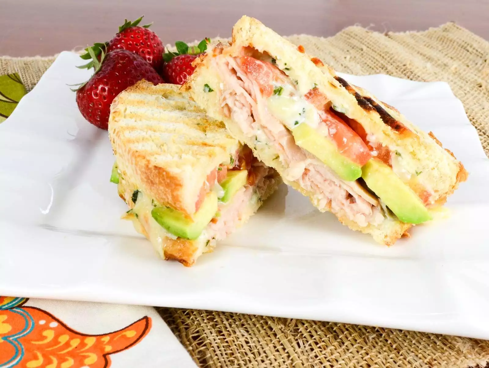 Turkey, Extra Sharp Cheddar, Tomato, and Avocado Panini with Basil Mayonnaise