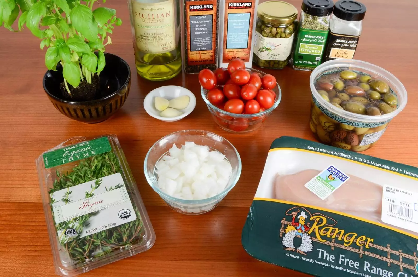 Baked Mediterranean Chicken Breasts with Tomatoes, Olives, Capers, and Garlic