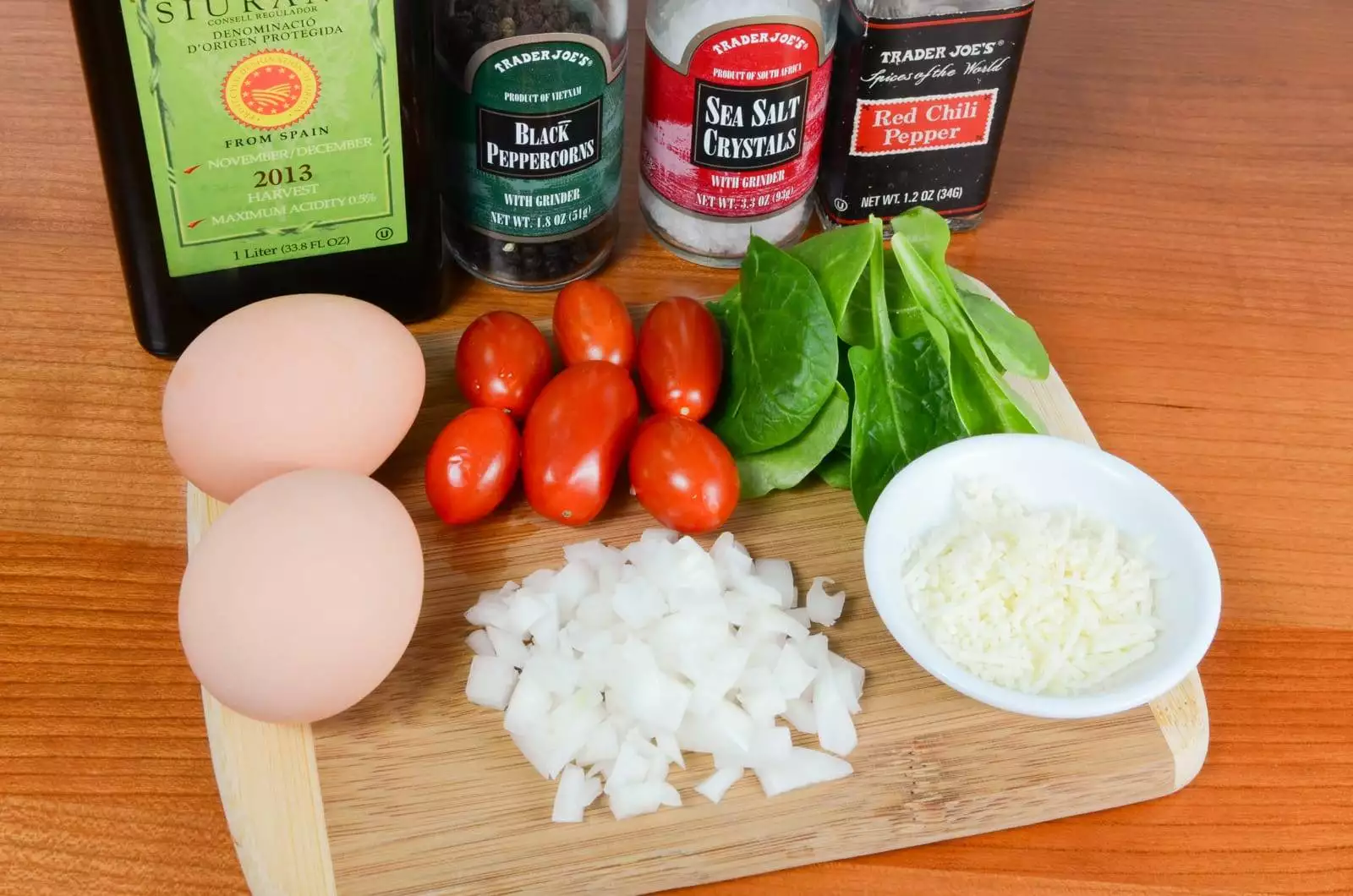 Baked Eggs with Sautéed Onions, Tomatoes, and Spinach