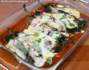 Cheesy Roasted Poblano Peppers with Homemade Refried Beans and Enchilada Sauce