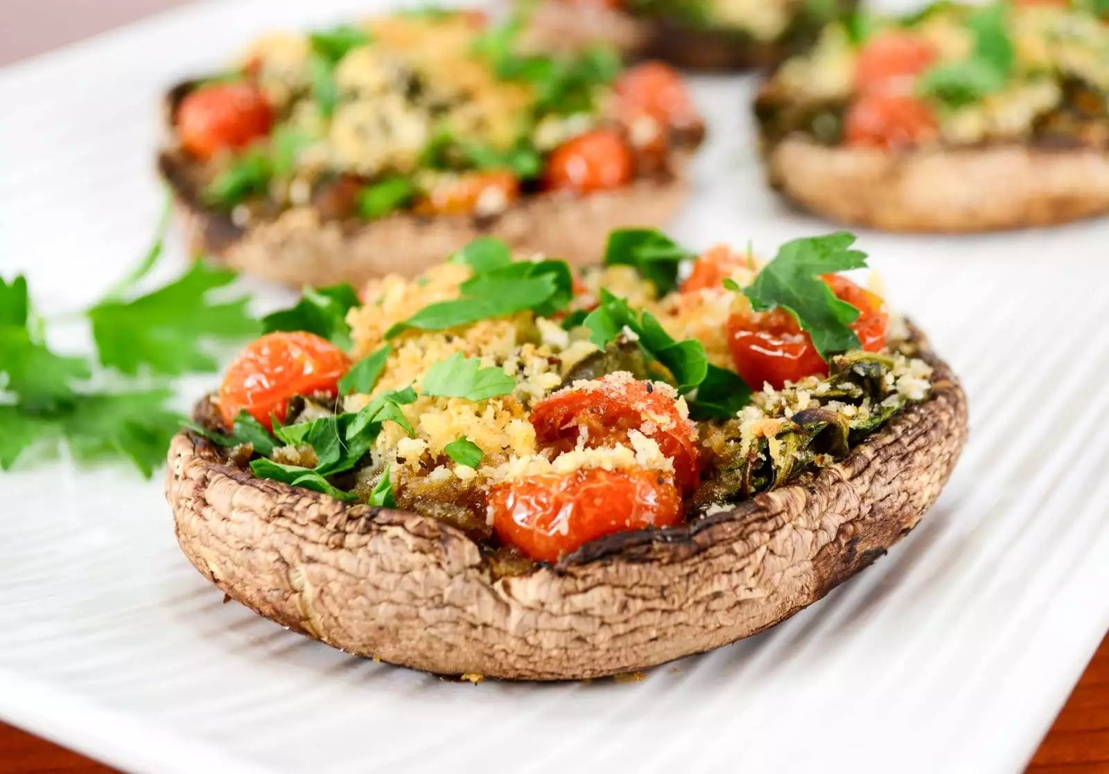 Roasted Portobello Mushrooms Stuffed with Spinach and Tomatoes