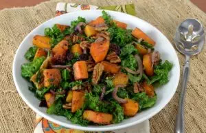 Kale Sauté with Roasted Butternut Squash, Dried Cranberries, and Pecans