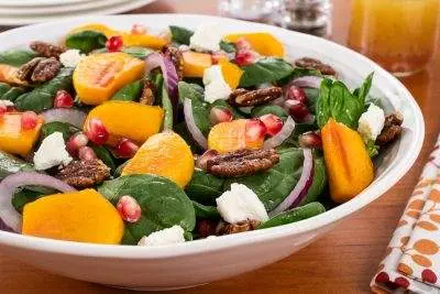 Spinach Salad with Persimmons, Pomegranate Seeds and Candied Pecans