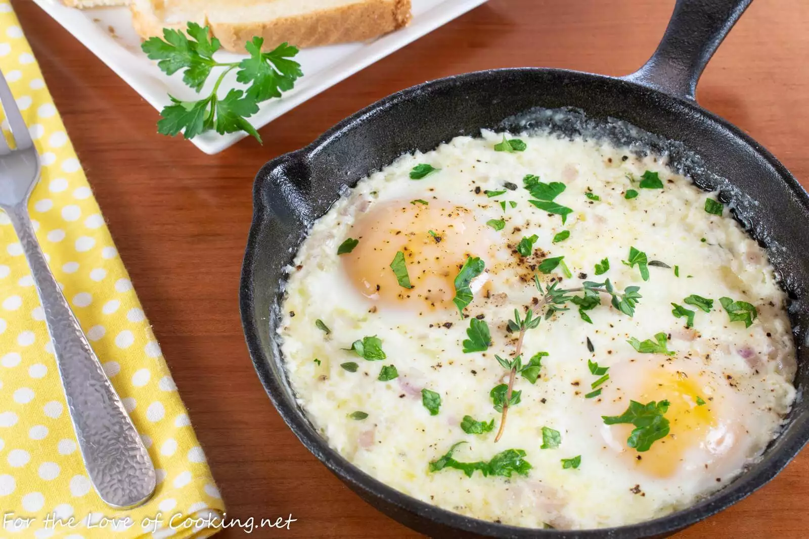 Skillet Baked Eggs with Cream and Parmesan