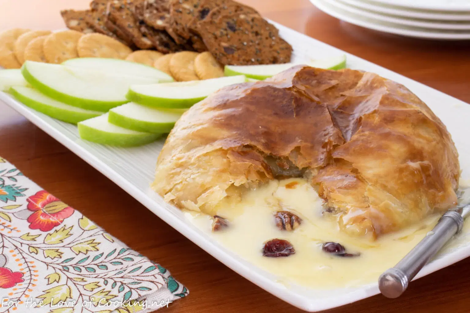 Baked Brie en Croute (with Honey, Candied Pecans and Cranberries)