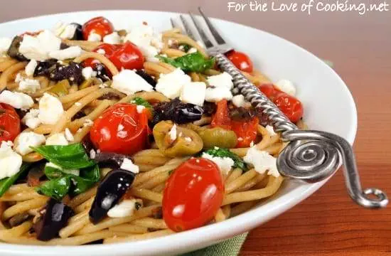 Spaghetti with Tapenade, Tomatoes, Spinach, Arugula, and Feta