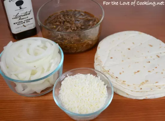 Shredded Beef, Caramelized Onion, and Cotija Cheese Baked Flautas