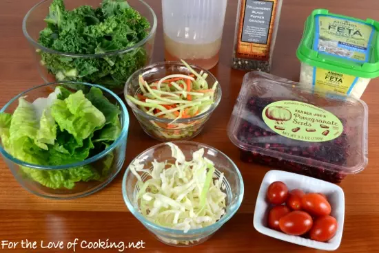 Kale Salad with Tomato, Pomegranate Seeds, and Feta