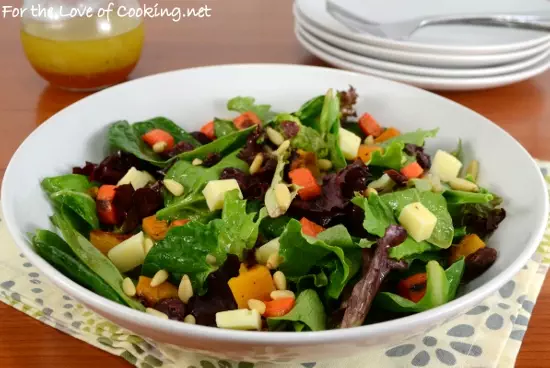 Roasted Carrot and Butternut Squash Salad with Mixed Greens, Extra Sharp Cheddar, and Pine Nuts