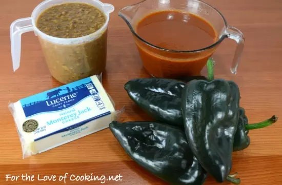 Cheesy Roasted Poblano Peppers with Homemade Refried Beans and Enchilada Sauce