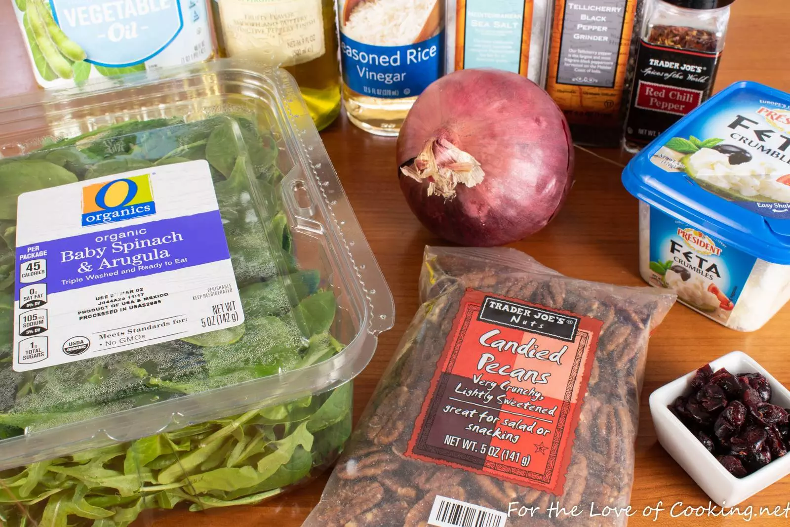 Spinach & Arugula Salad with Marinated Onion, Feta, Cranberry, and Candied Pecans